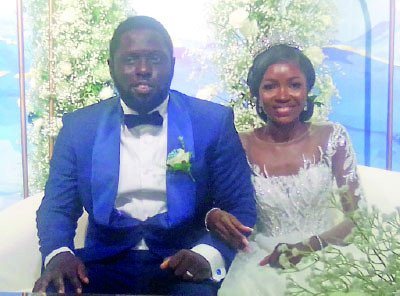 The 29-year-old groom and his 28-year-old bride, both virgins, get married in lagos (pictured)